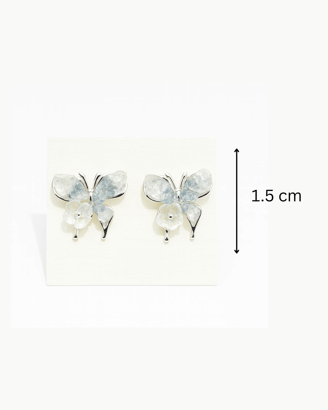 White butterfly studs