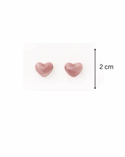 Pink cat eye heart studs