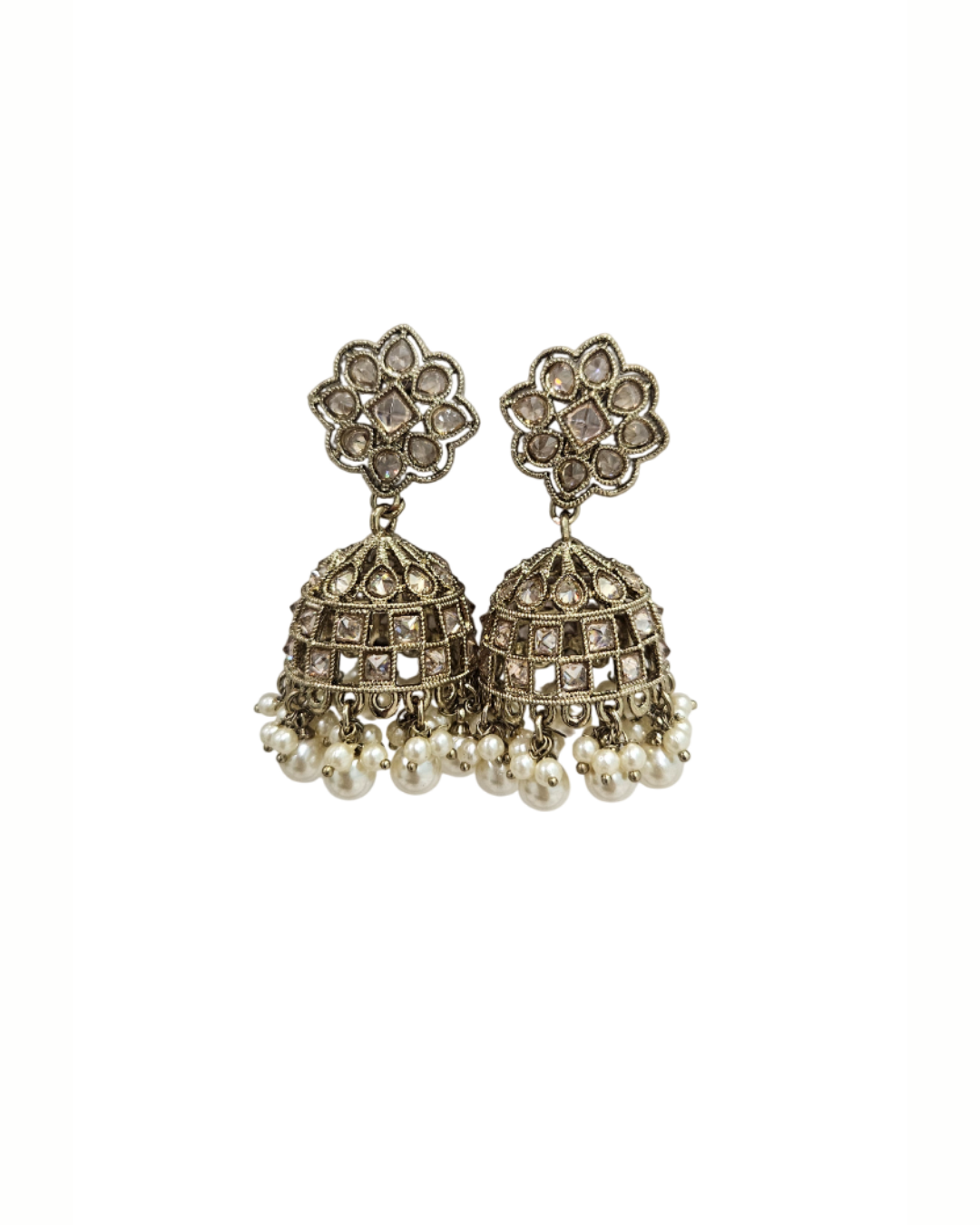 Brass tone jaali jhumka in champagne colour