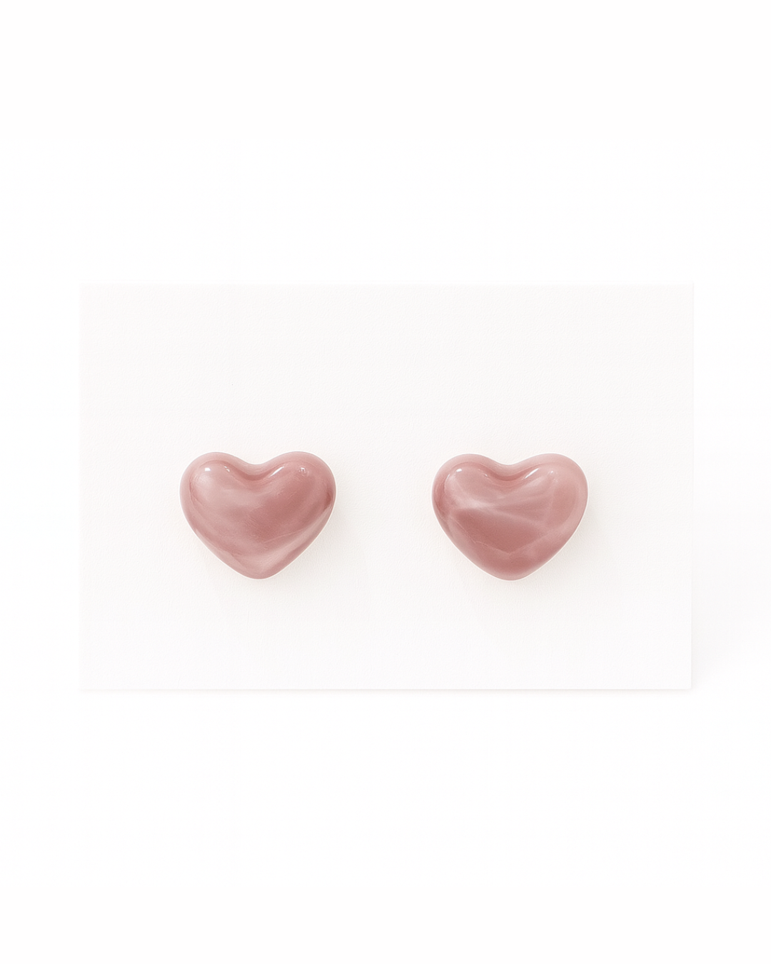 Pink cat eye heart studs