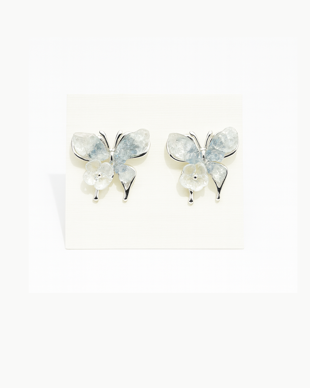 White butterfly studs