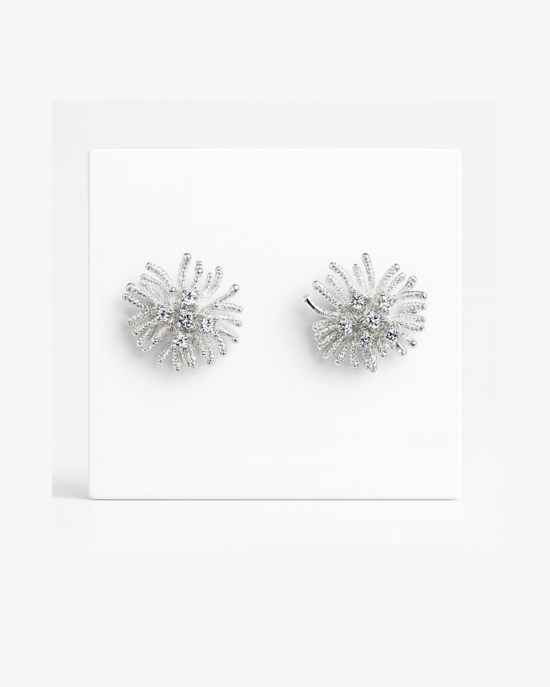 Silver star earrings with pearl